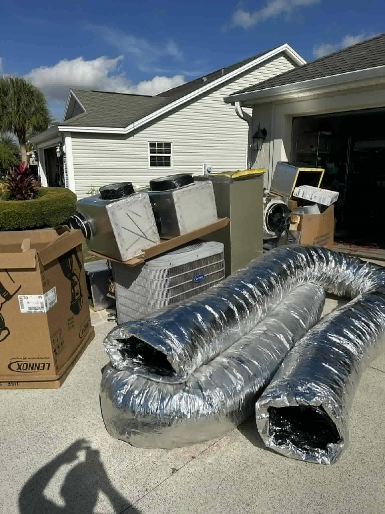 New ductwork and equipment staged for a FL HVAC Services duct modification job in Florida