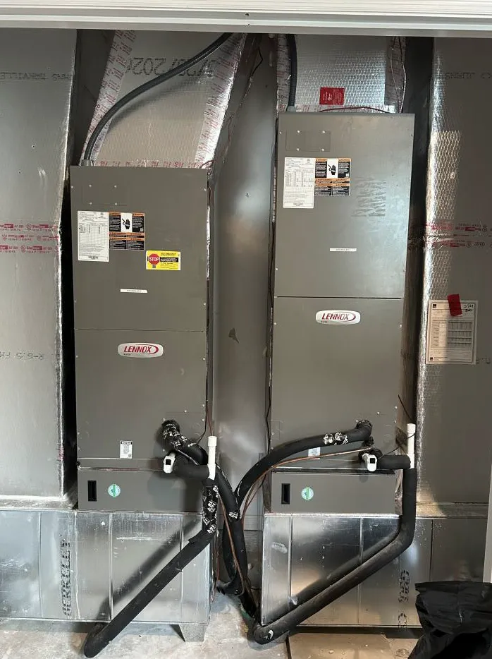 Two Lennox air handlers correctly installed by FL HVAC Services with sealed ductwork and neatly run lines