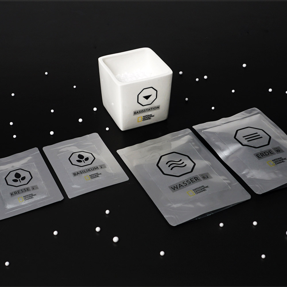 National Geographic Mars-Set als Personal Mailing mit Samen, Erde, Wasser und Basisstation in futuristischem Design.