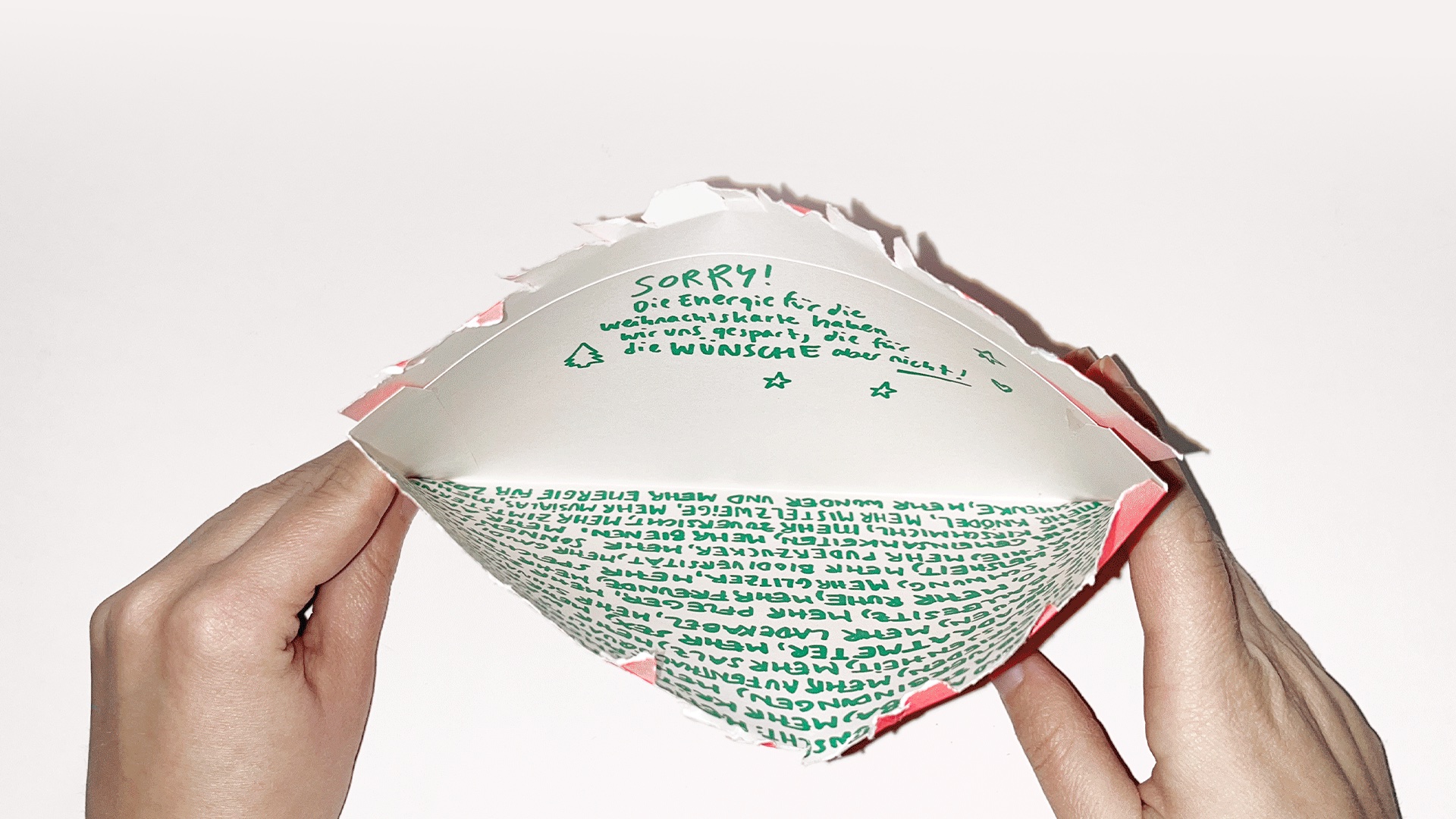 Weihnachtskarte aufgeklappt ohne Inhalt nur Text auf den Umschlag für Geschäftskudnen.