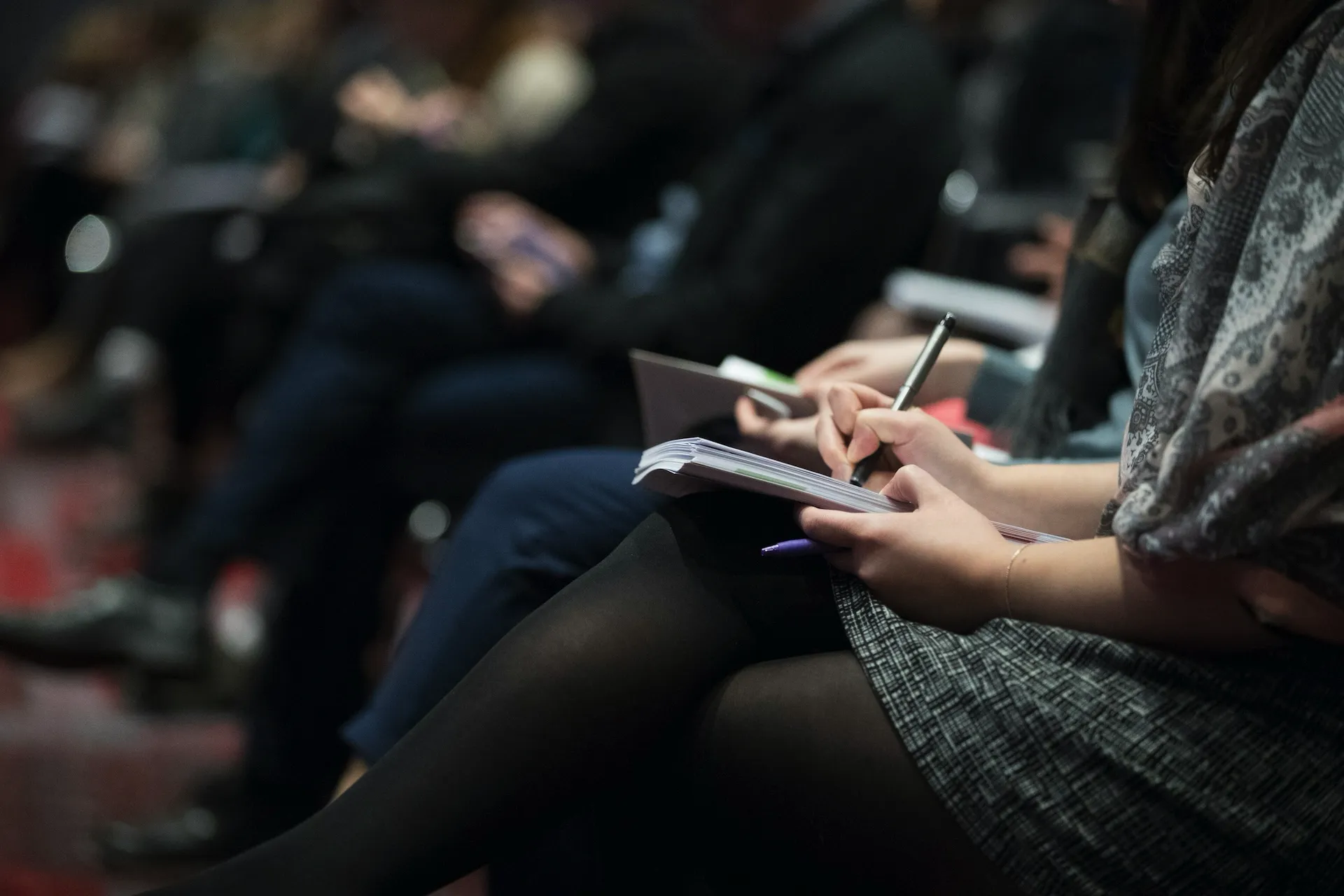 An image of people sitting in a seminar