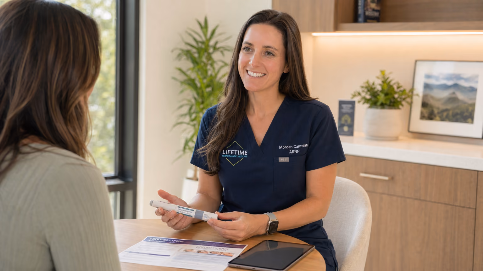 Morgan Carmean, ARNP, consulting with a patient about semaglutide for weight loss at Lifetime Surgical