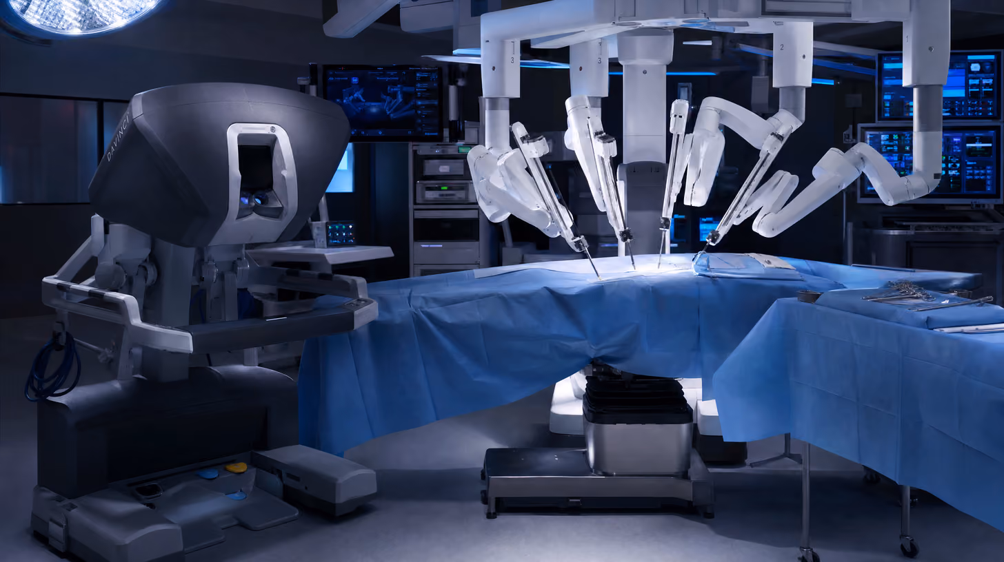 Da Vinci robotic surgery system console and robotic arms in modern operating room