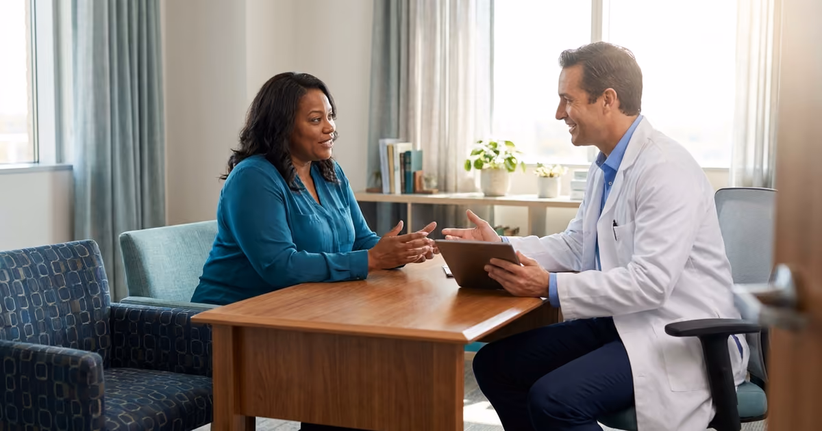 Surgeon discussing weight-loss surgery eligibility with a plus-size patient in San Jose