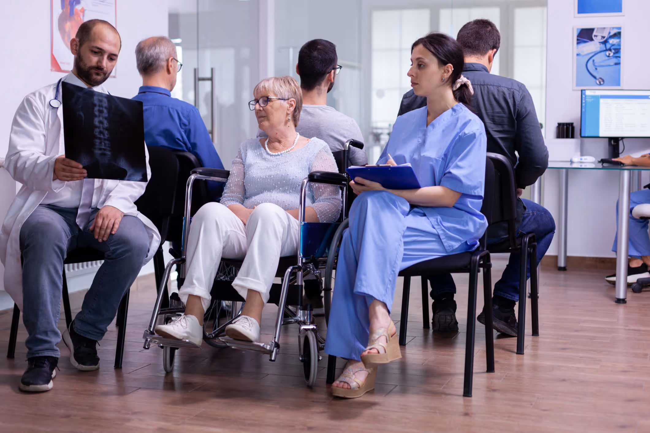 A doctor speaking to a patient about spinal cord injury facts.