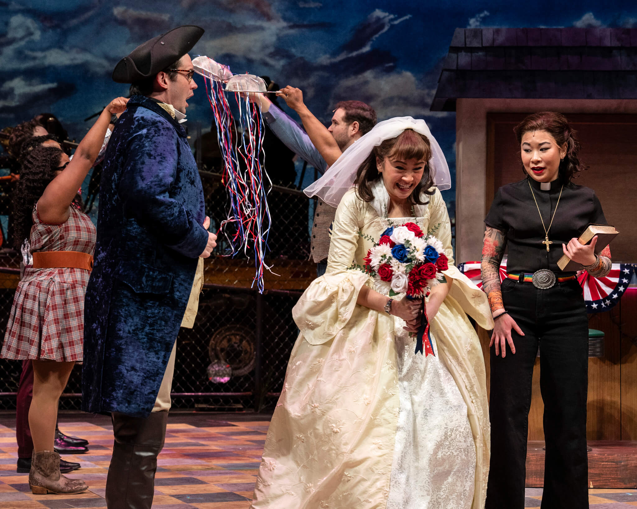 Dawn grinning at her wedding in Olney Theatre's production of Waitress