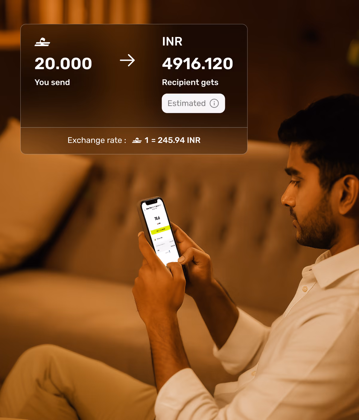 Man sitting on couch using phone to send 20 pounds, recipient gets 4916.12 INR at 245.94 INR exchange rate.