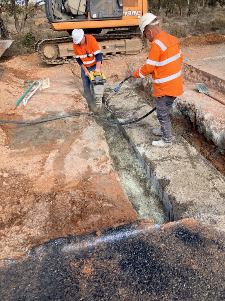 Workers working on a culvert project
