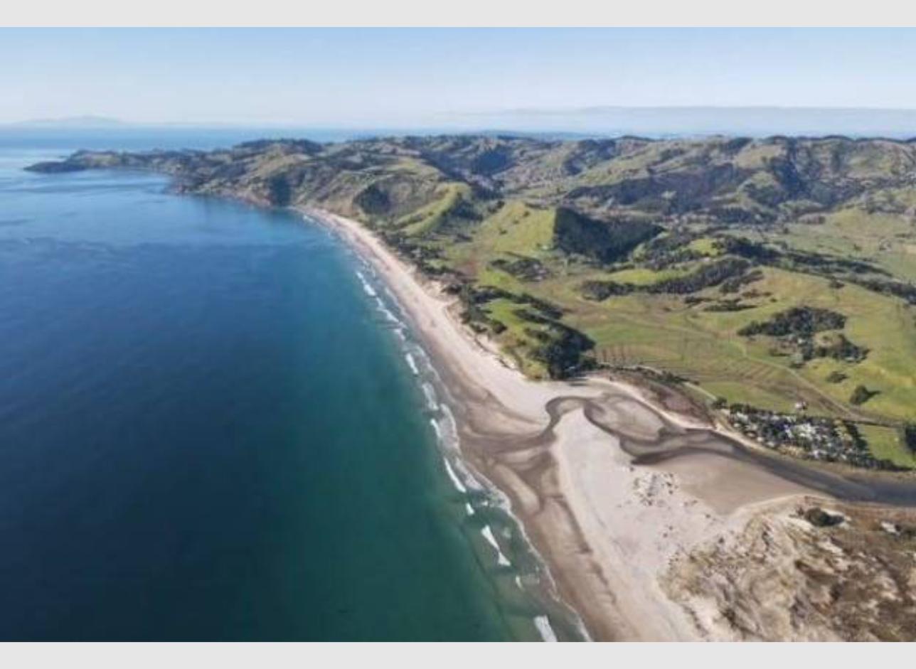 Pakiri Beach white sand coastline and campervan holiday park north of Auckland New Zealand