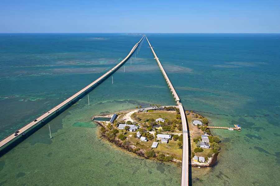 Aerial view of the Seven Mile Bridge and the old bridge running out to sea past Pigeon Key in the Florida Keys