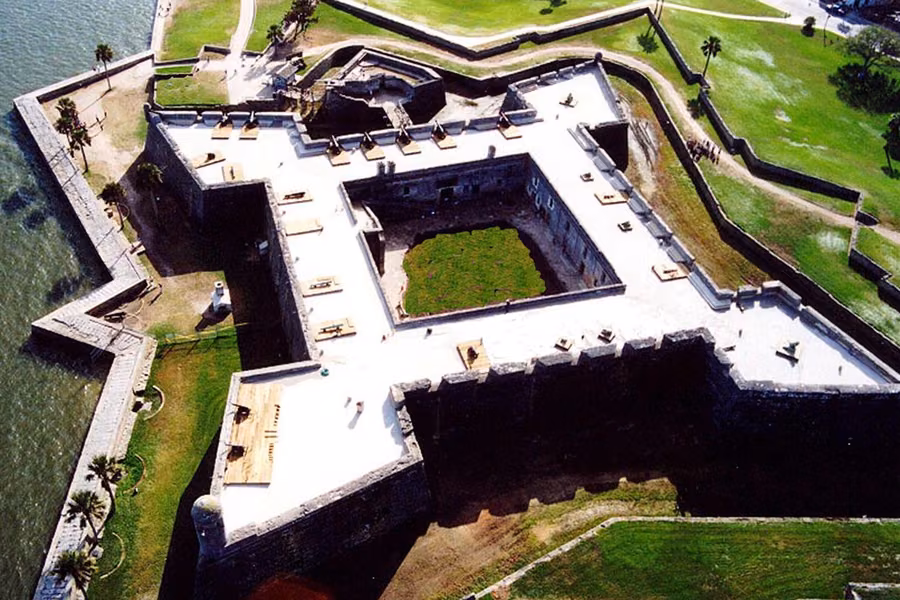 Aerial view of the star-shaped Castillo de San Marcos beside the water in St Augustine