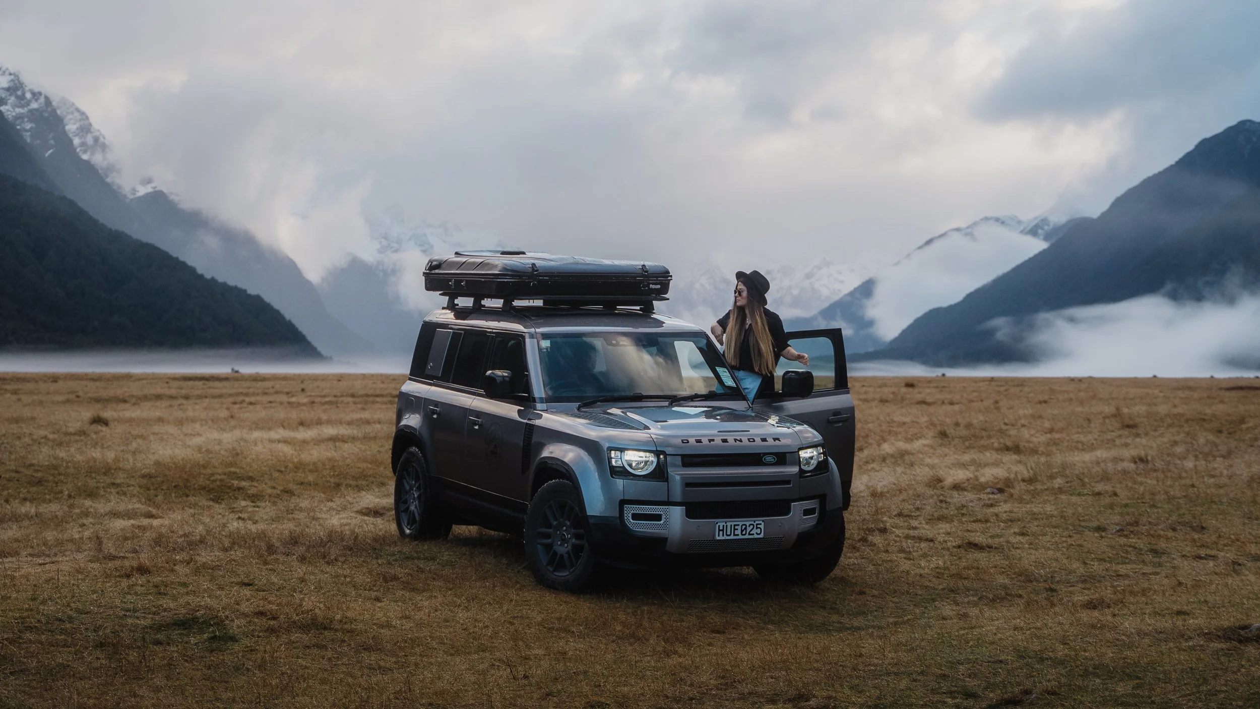 Trekker Adventures 4WD with rooftop tent in a misty mountain valley in New Zealand