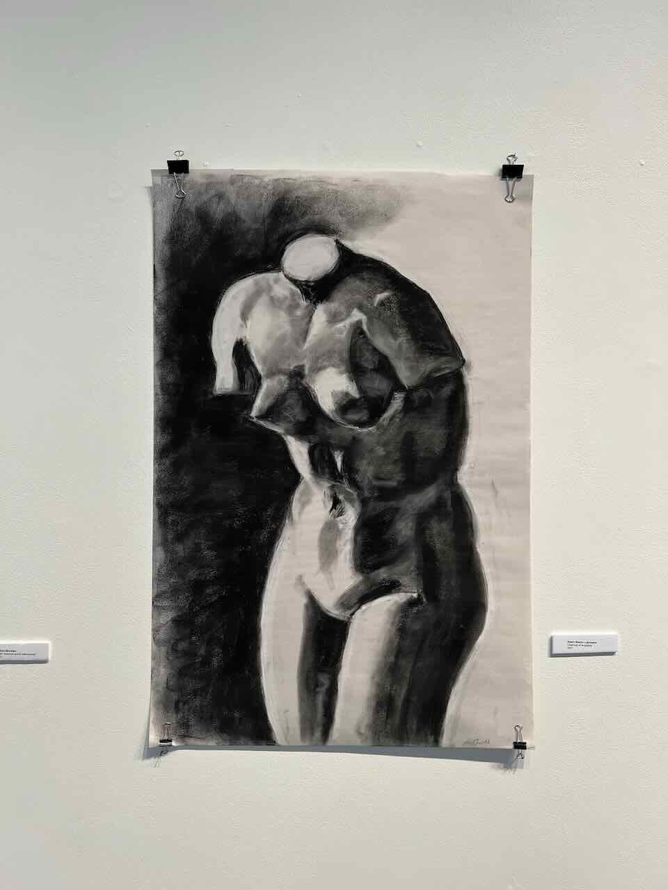 Charcoal drawing of a torso sculpture