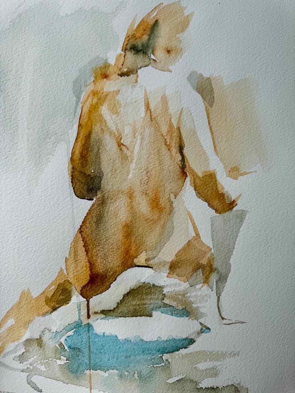 Seated figure, painted in watercolor