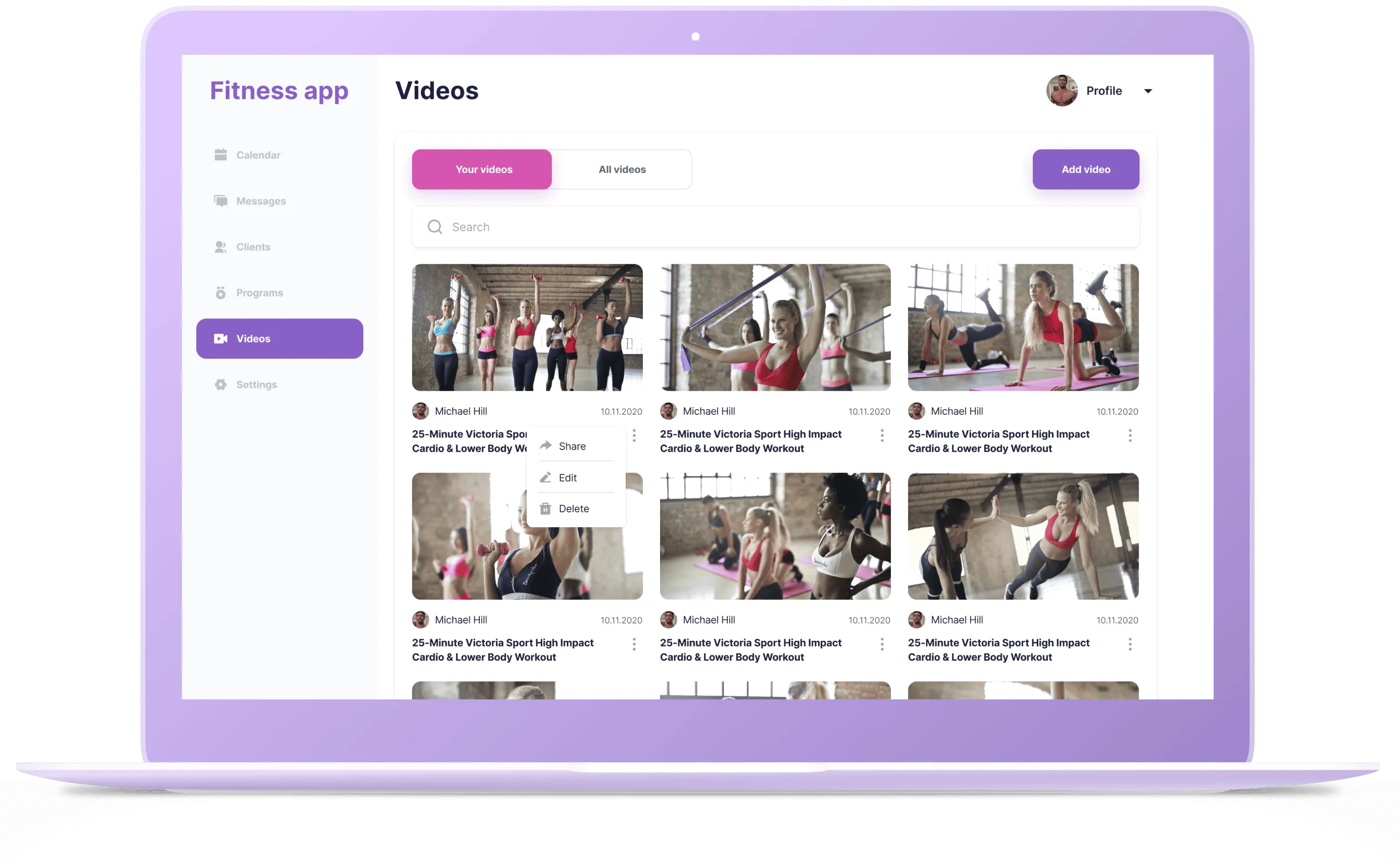 Laptop screen displaying a fitness app videos section with workout thumbnails and menu options.