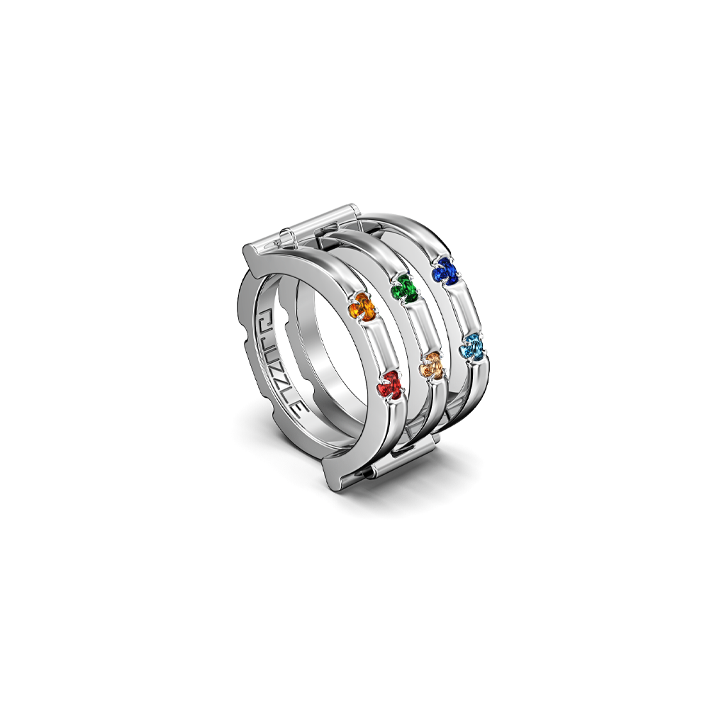 Colorful edition of Juzzle rings in silver with blue and yellow accent modules.