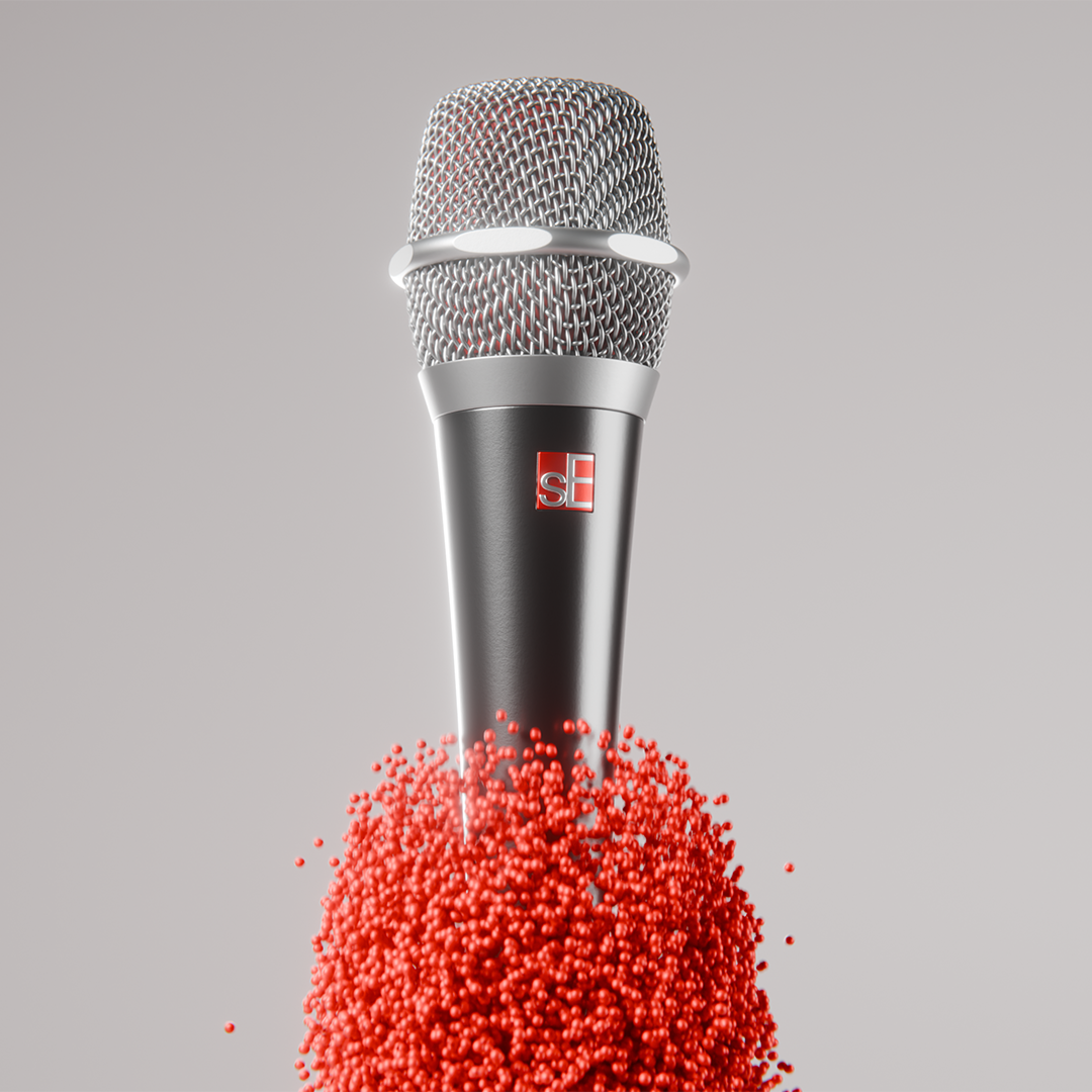 Macro view of sE microphone grille with red particles rising from the top, abstract audio concept.