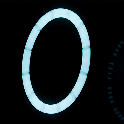 Stylized ring of light surrounding the DWISS timepiece.