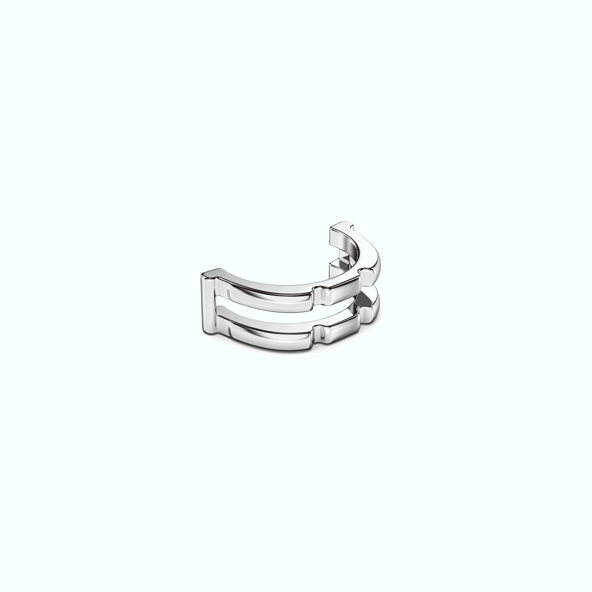 A 3D render showing the two separate, interlocking silver components of a Juzzle ring.