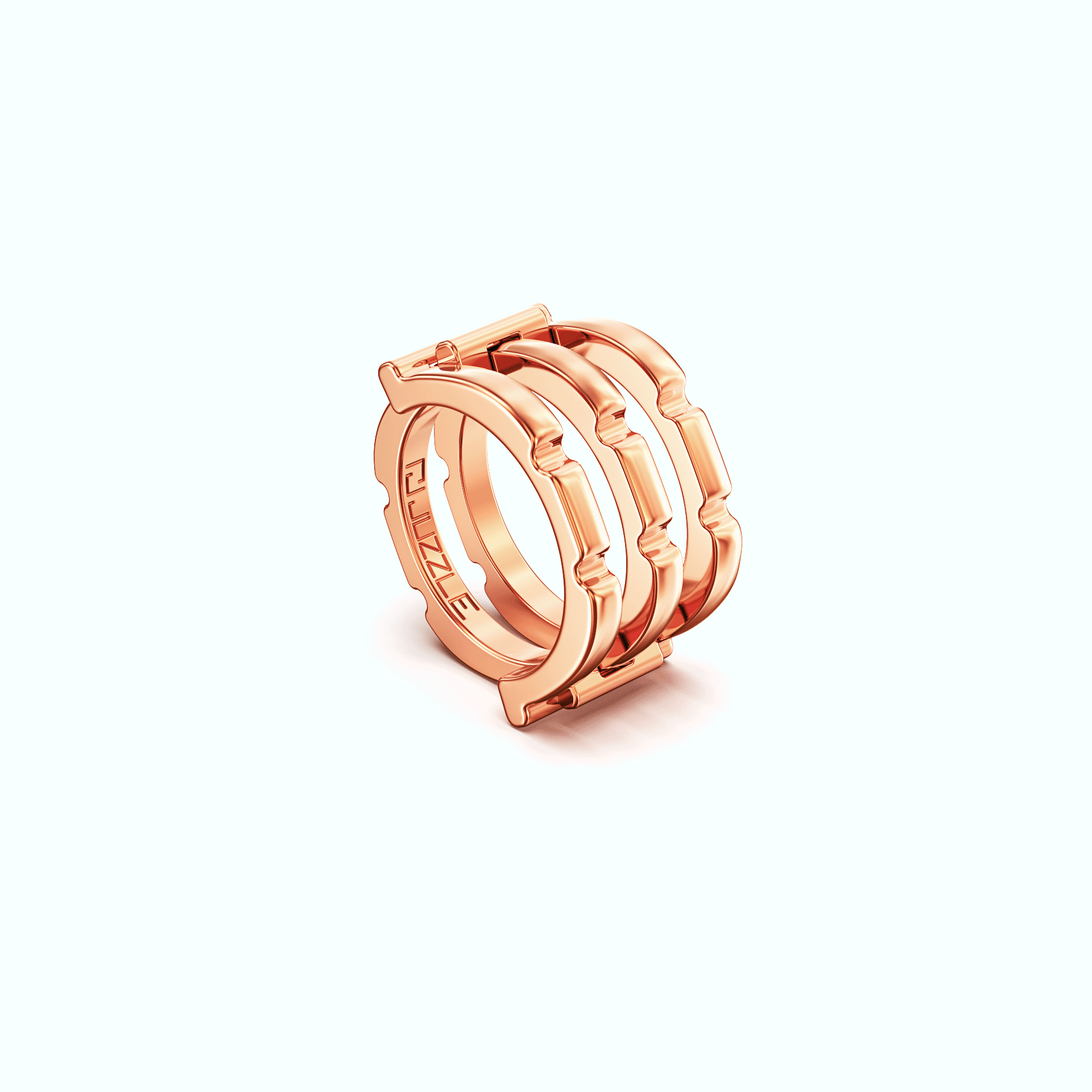 A 3D render showing the two separate, interlocking gold components of a Juzzle ring.