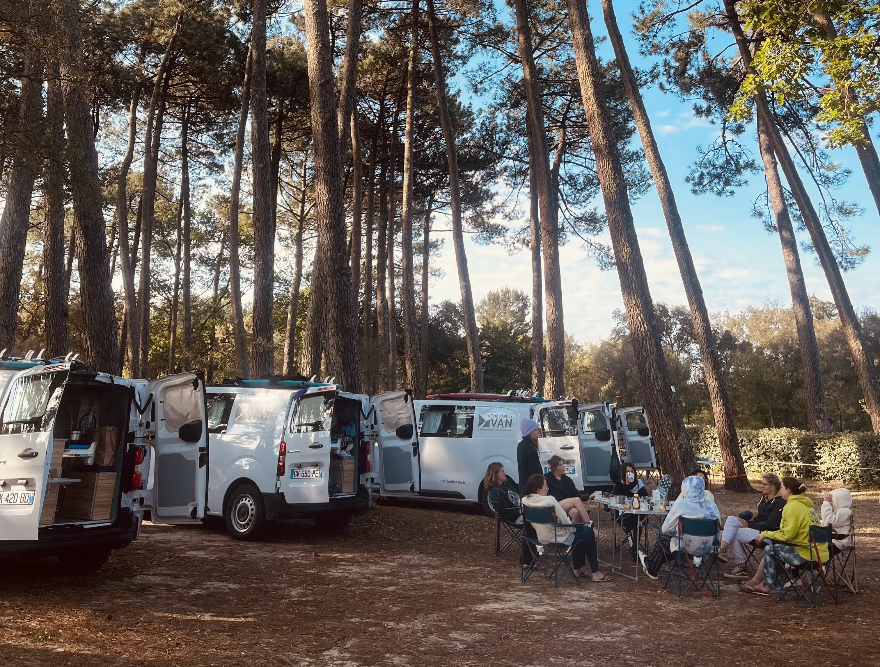 Surfcamp South West France The Family Van. Participants having lunch at the camp with the campervans.