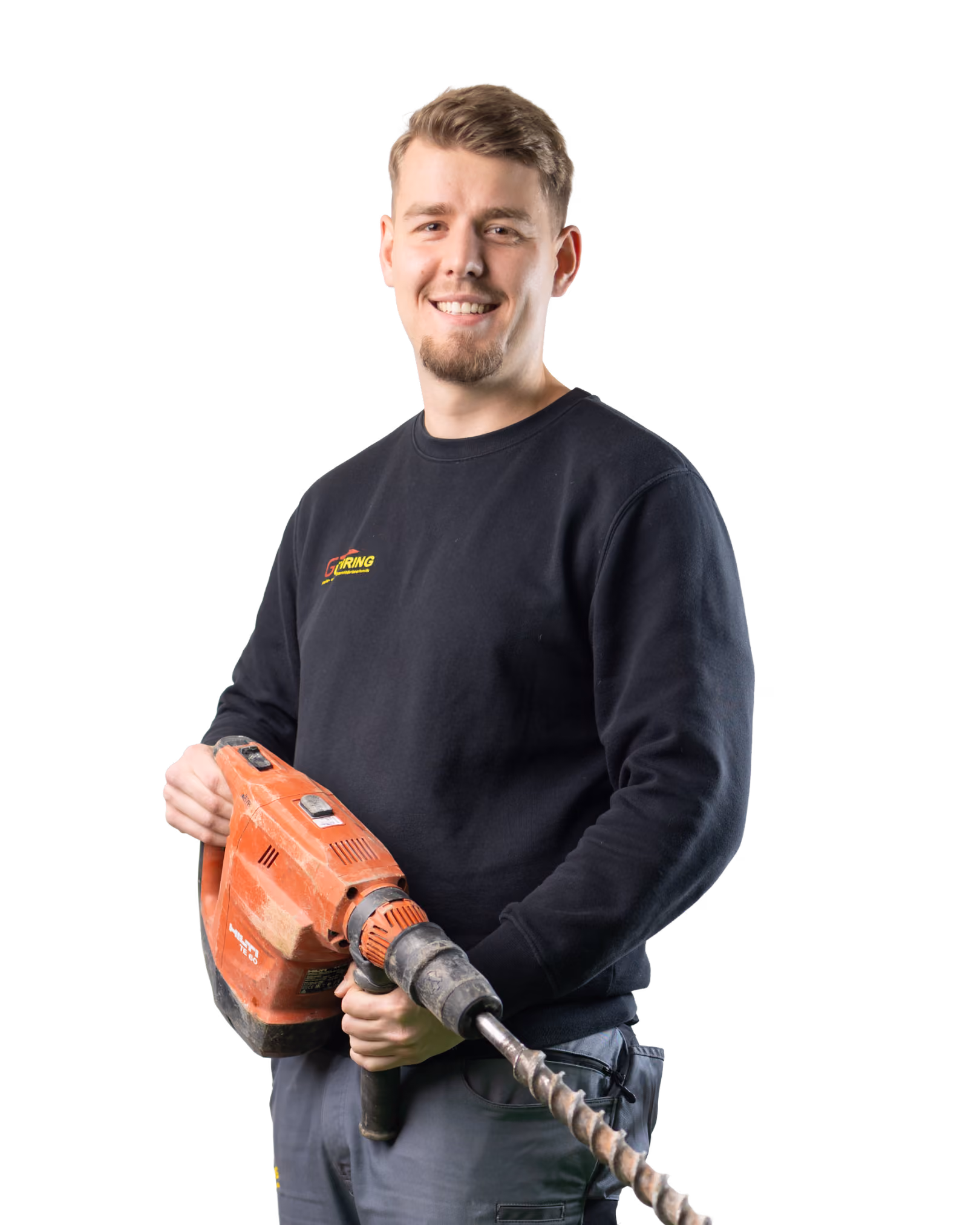 Mitarbeiter mit Bohrhammer.