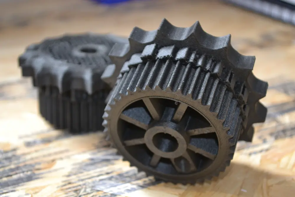 Black 3D printed functional gears produced by Nexform