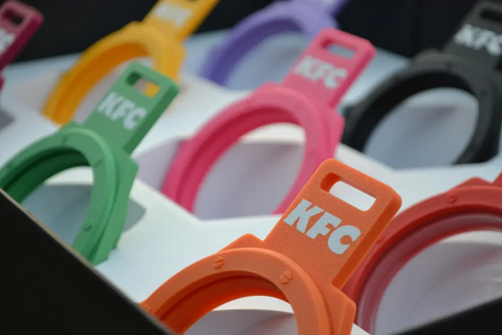 Colour matched KFC branded clips manufactured by Nexform