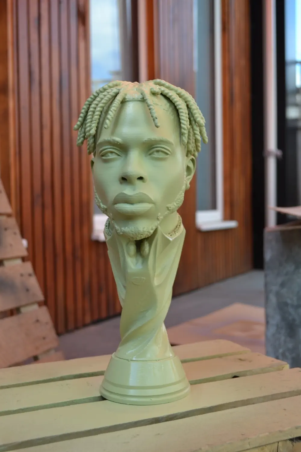 Metallic finished 3D printed trophy bust produced by Nexform
