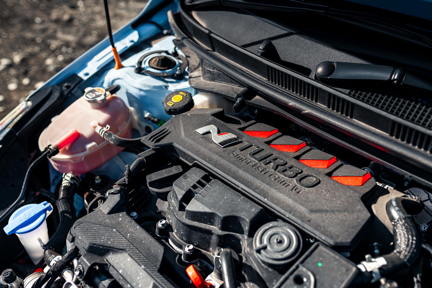 Hyundai i20N Performance Blue Rush Magazine review - engine bay detail image of 1.6-litre turbocharged inline-four