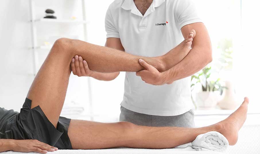 a close up of man getting treatment from a physio