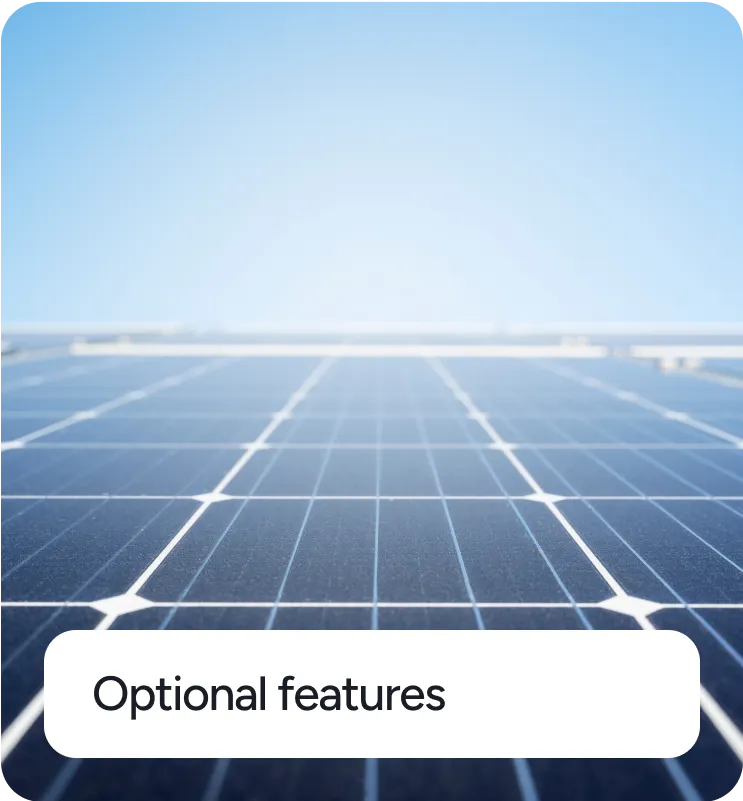 Close-up view of solar panels under a clear blue sky with text 'Optional features'.