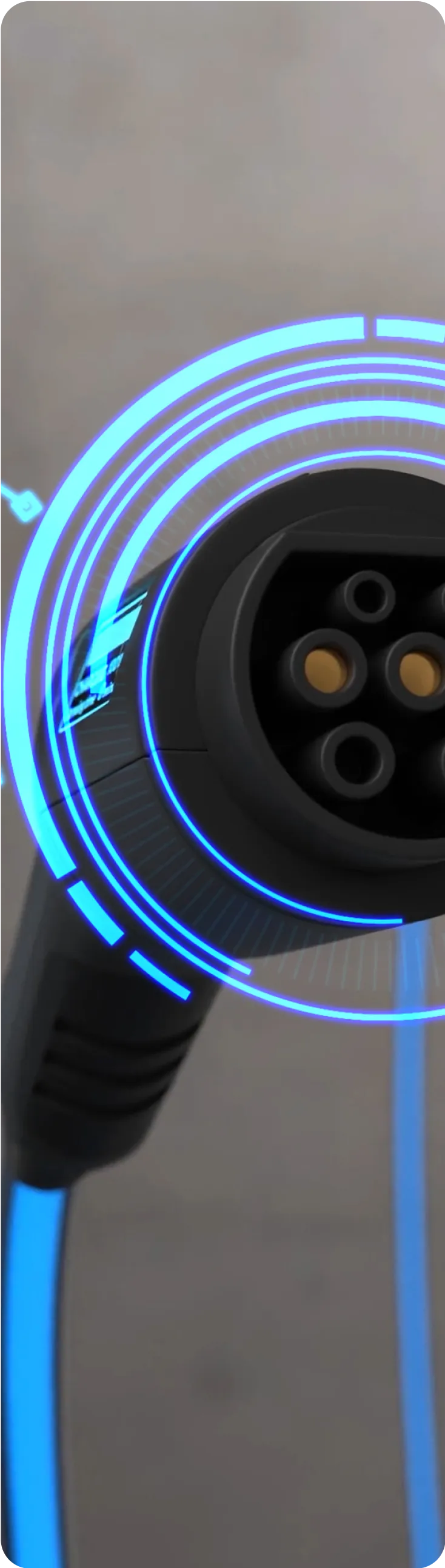 Close-up of an electric vehicle charging connector with glowing blue digital interface graphics.
