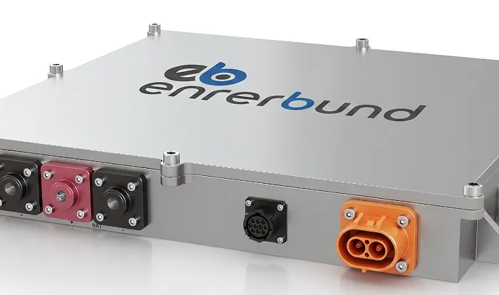Silver rectangular ennerbund battery charger with multiple colored connectors including black, red, and orange ports.