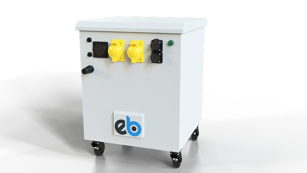 White electrical power distribution box on wheels with multiple yellow and black power sockets and a small green indicator light.