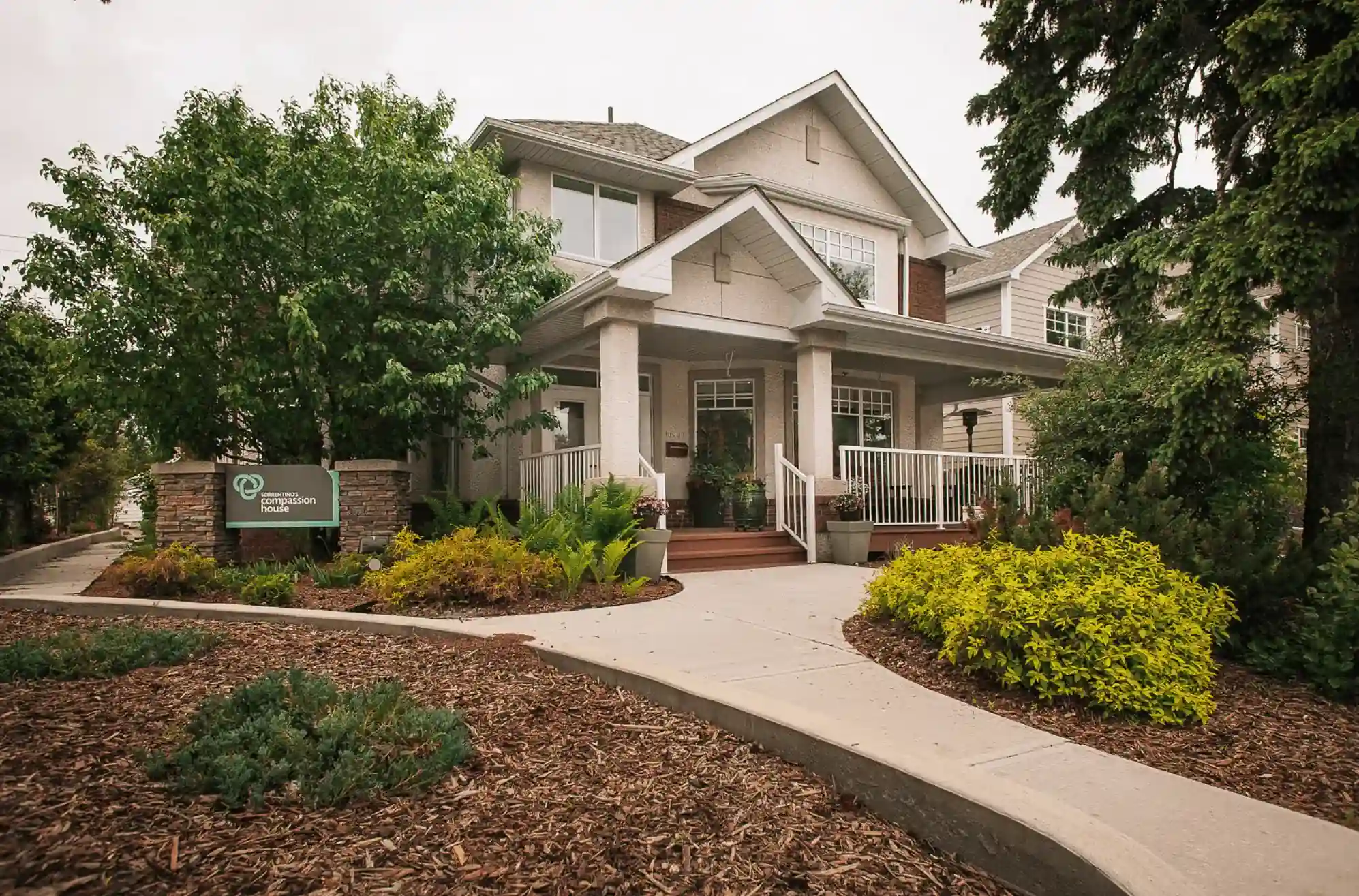 Image of front sidewalk of Compassion House 