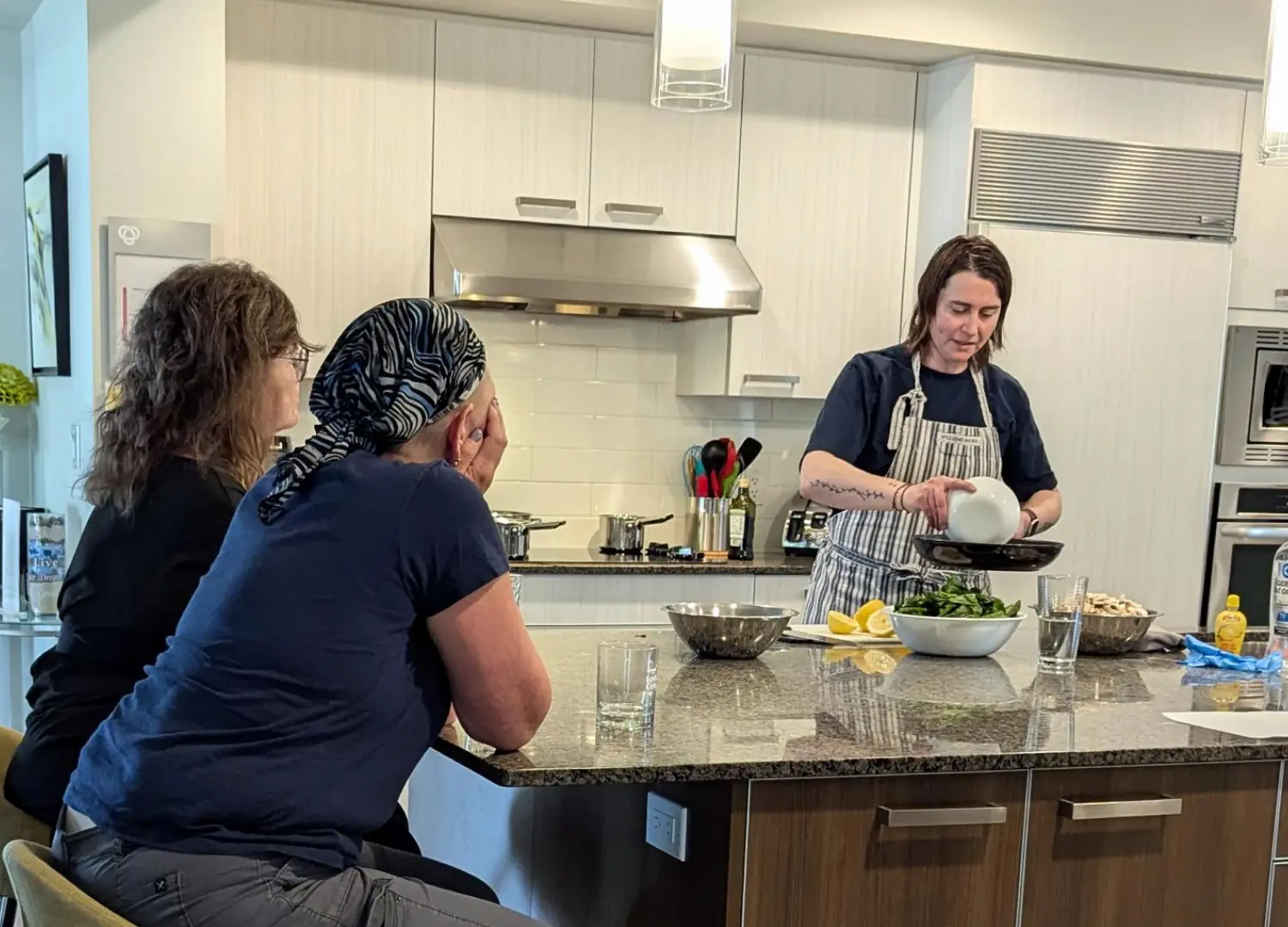 Women at cooking class at Compassion House