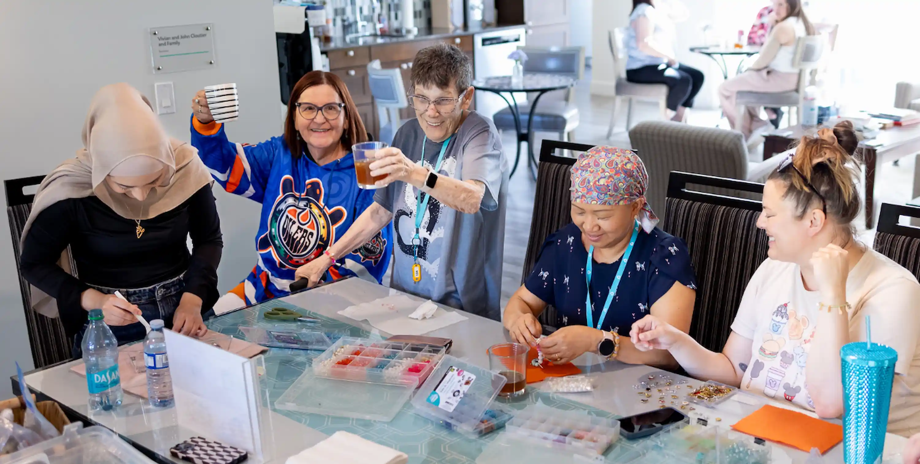 Women at table doing craft