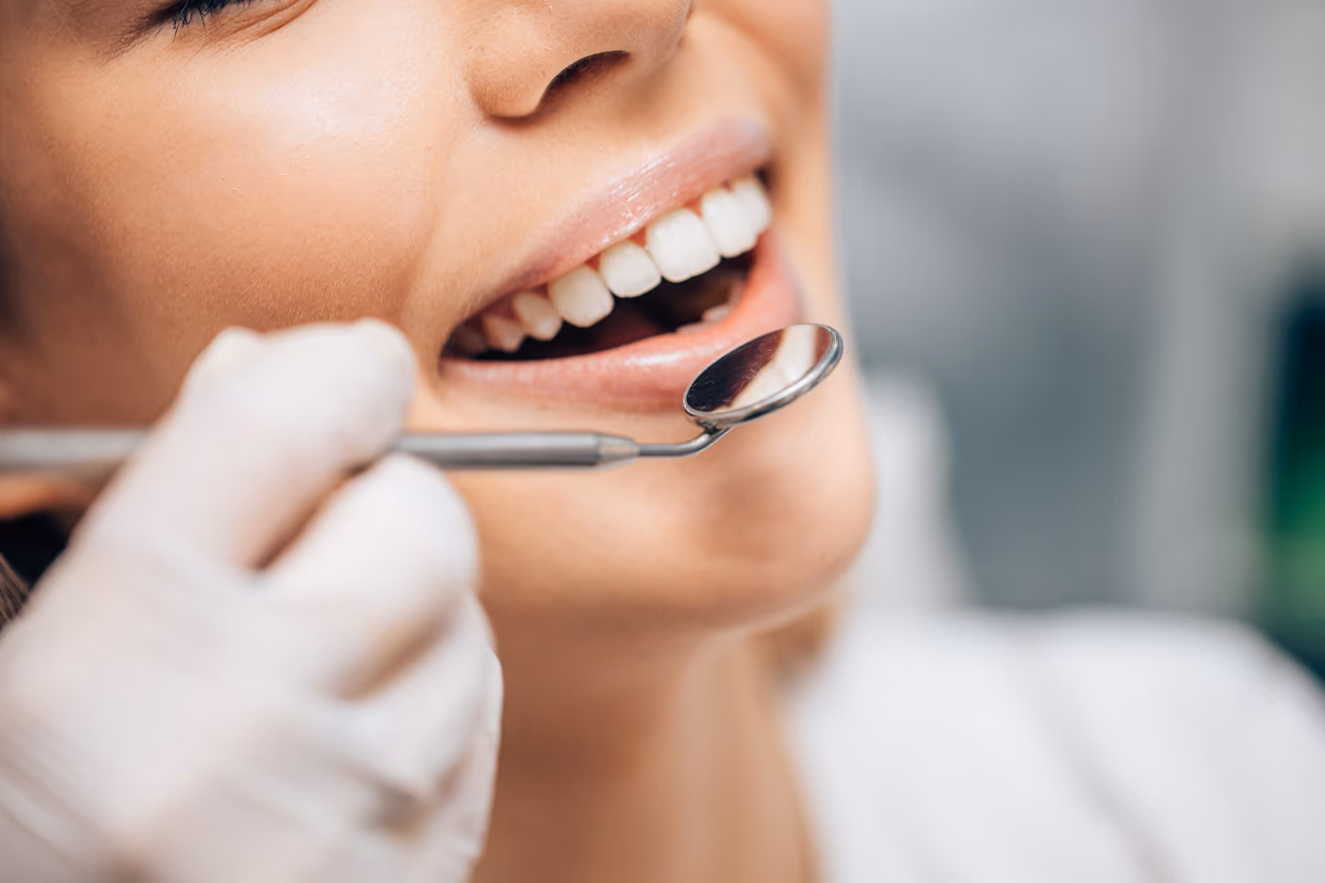 ttractive caucasian woman visiting dentist, doctor doing dental examination before treatment