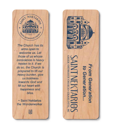 Double-sided wooden bookmarks from Saint Nektarios Greek Orthodox Church in Charlotte, NC, featuring a church illustration and a quote about the Church's welcoming arms and boldness from Saint Nektarios the Wonderworker.