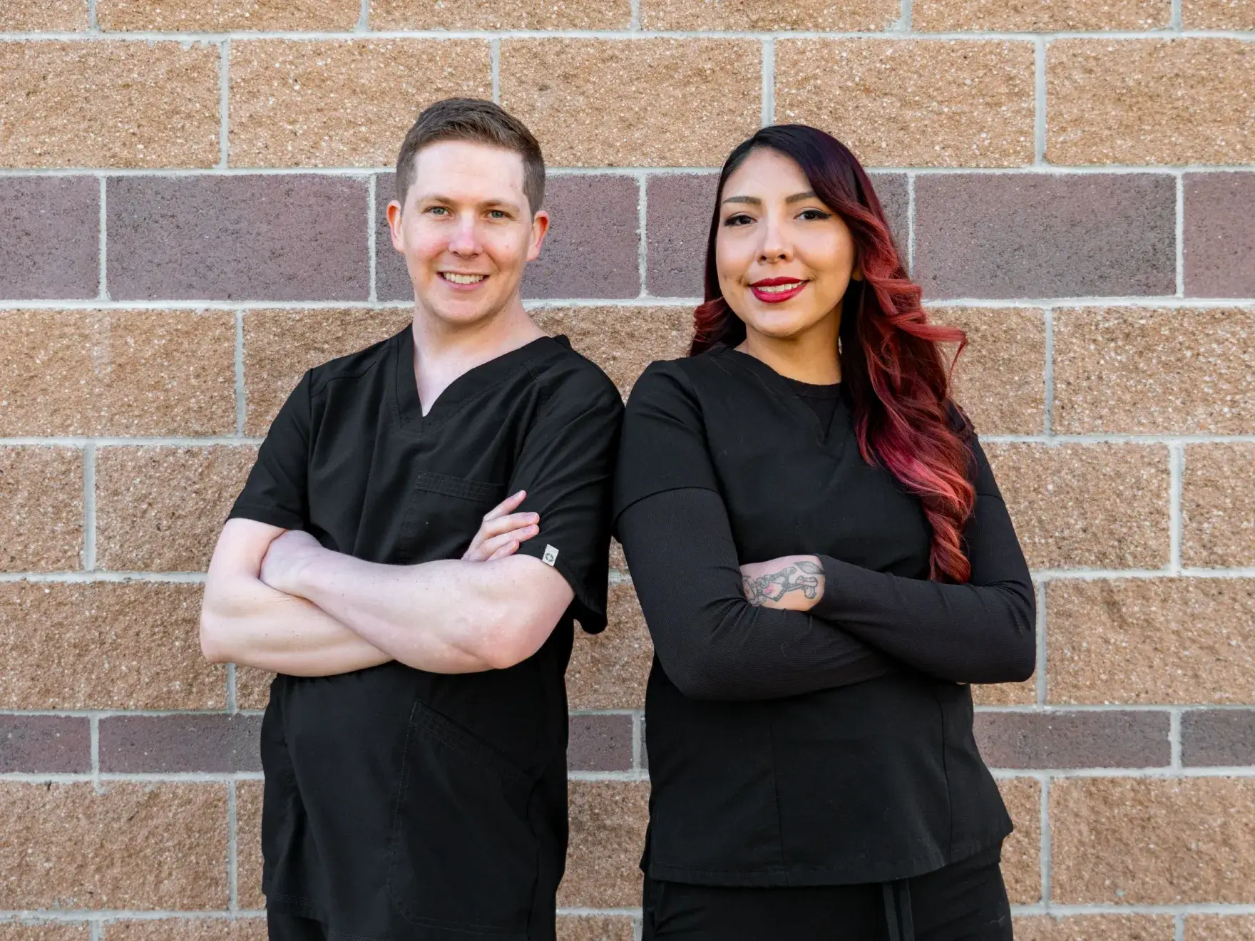 A dental office features a machine with a touchscreen and hoses beside a patient chair.