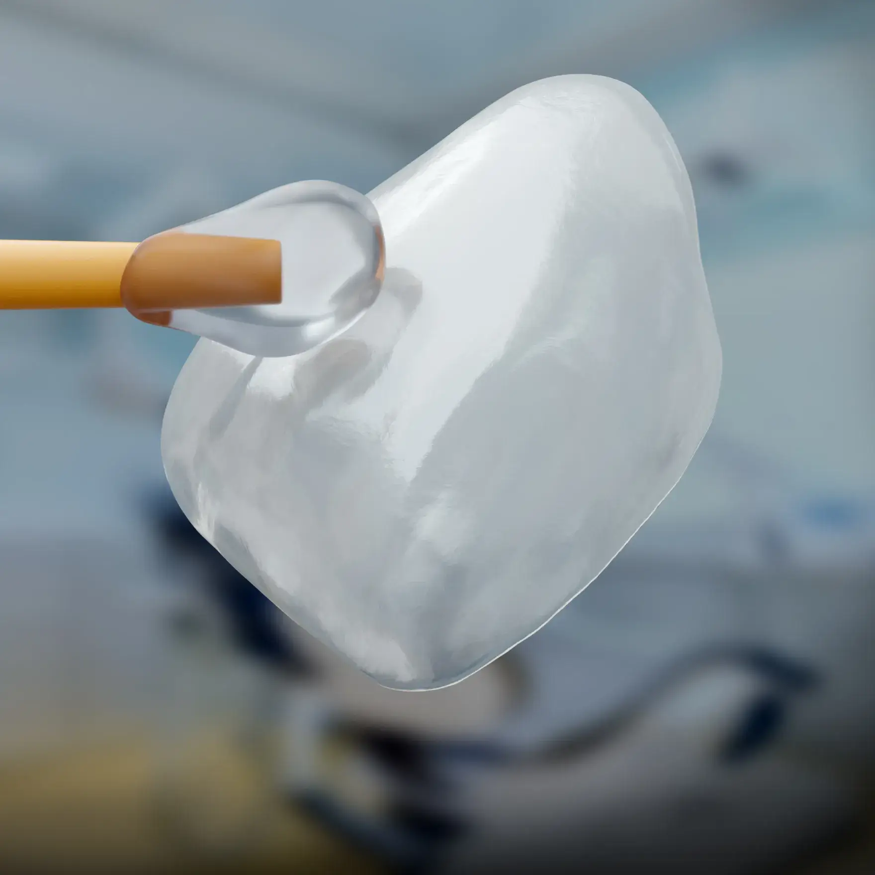 Dentist's office with an empty reclining chair facing a mounted flat-screen TV on the wall.