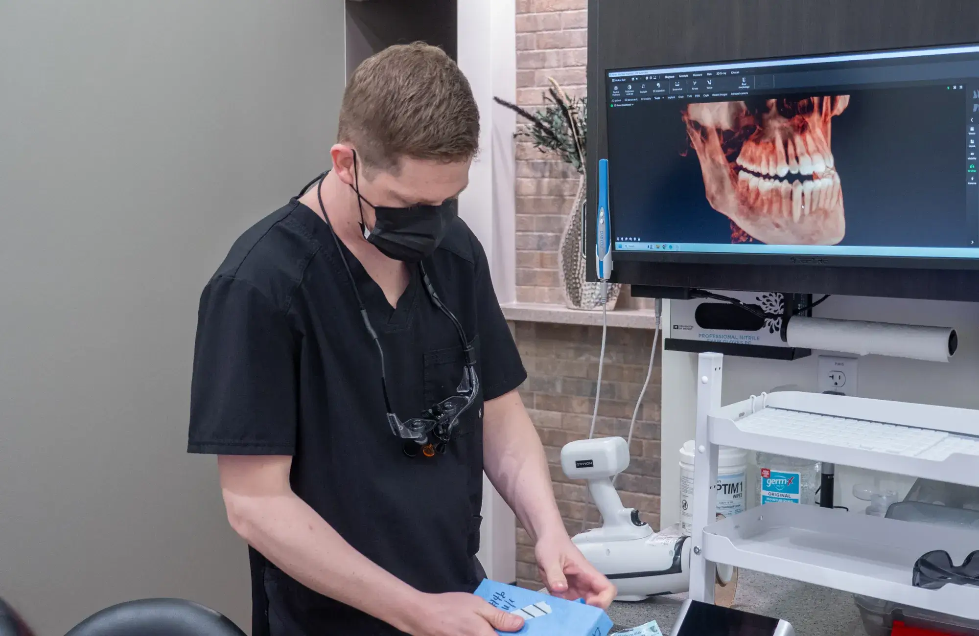 Glass door with "Carbon Valley Dental Co." sign and contact information for Kyle P. Walker, DDS.