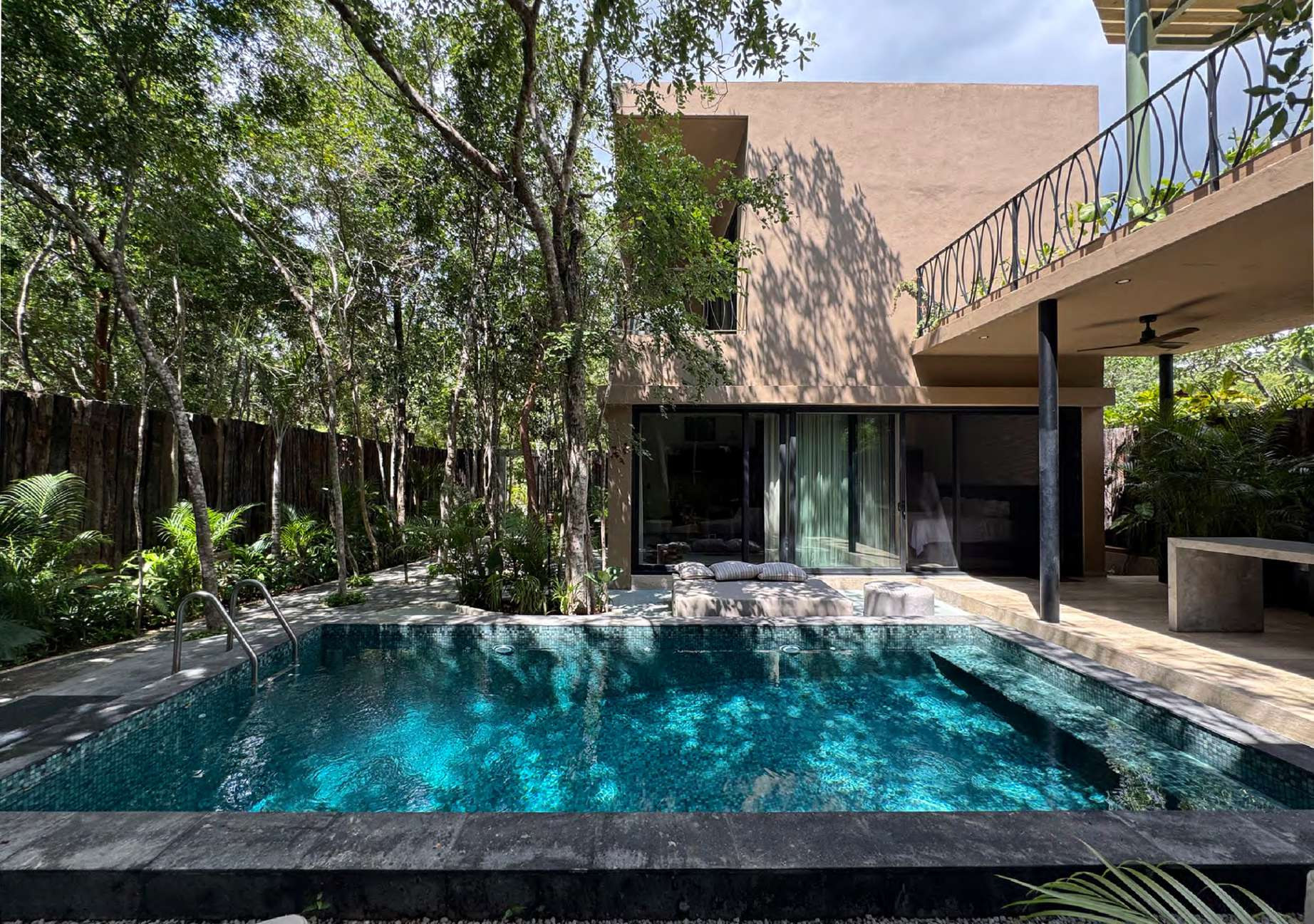 Pool set under jungle canopy at House Yaxche, Region 15 Tulum