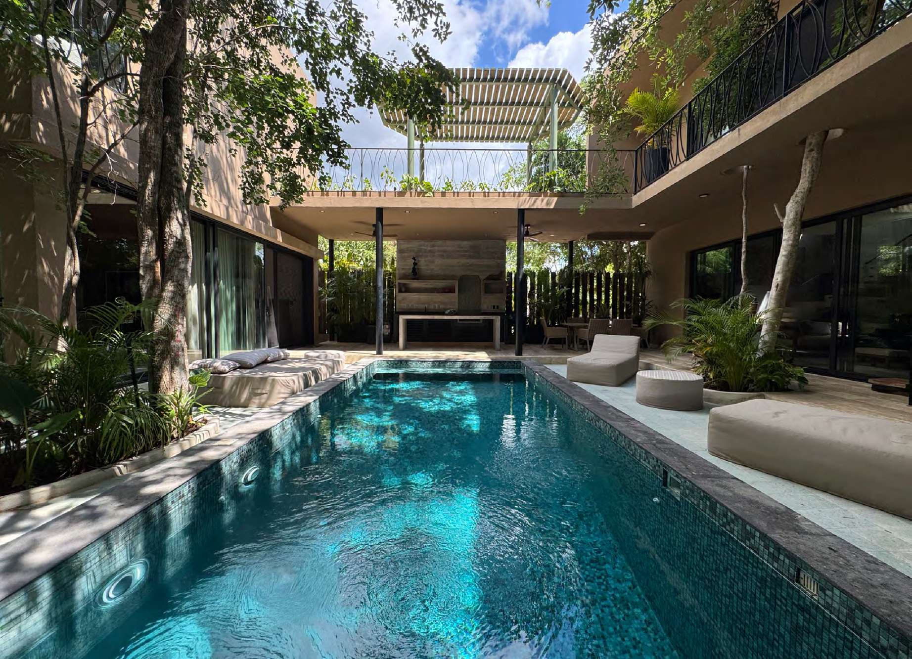Pool and covered grill pavilion at House Yaxche, Casa Verde Tulum