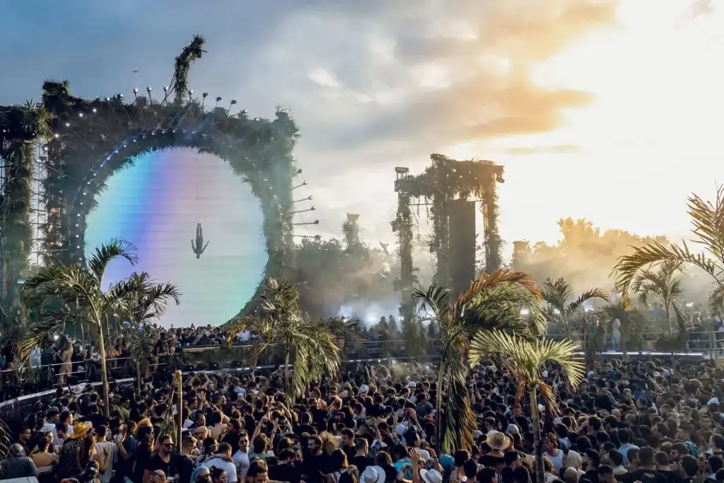Day Zero circular portal stage in the Tulum jungle at dusk