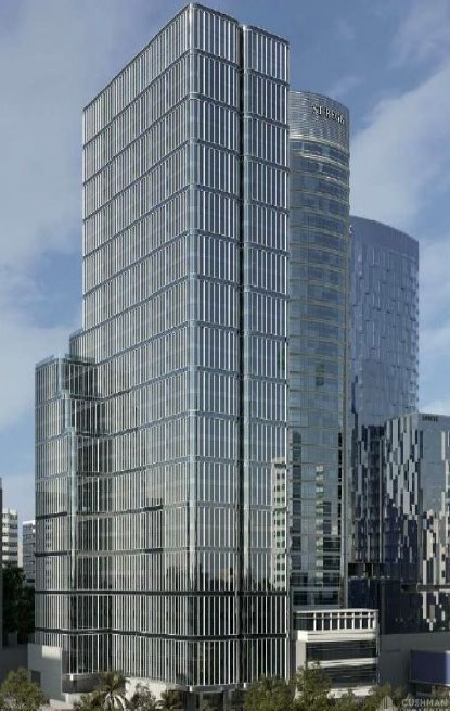 Glass corporate office tower against the Mexico City skyline on Paseo de la Reforma