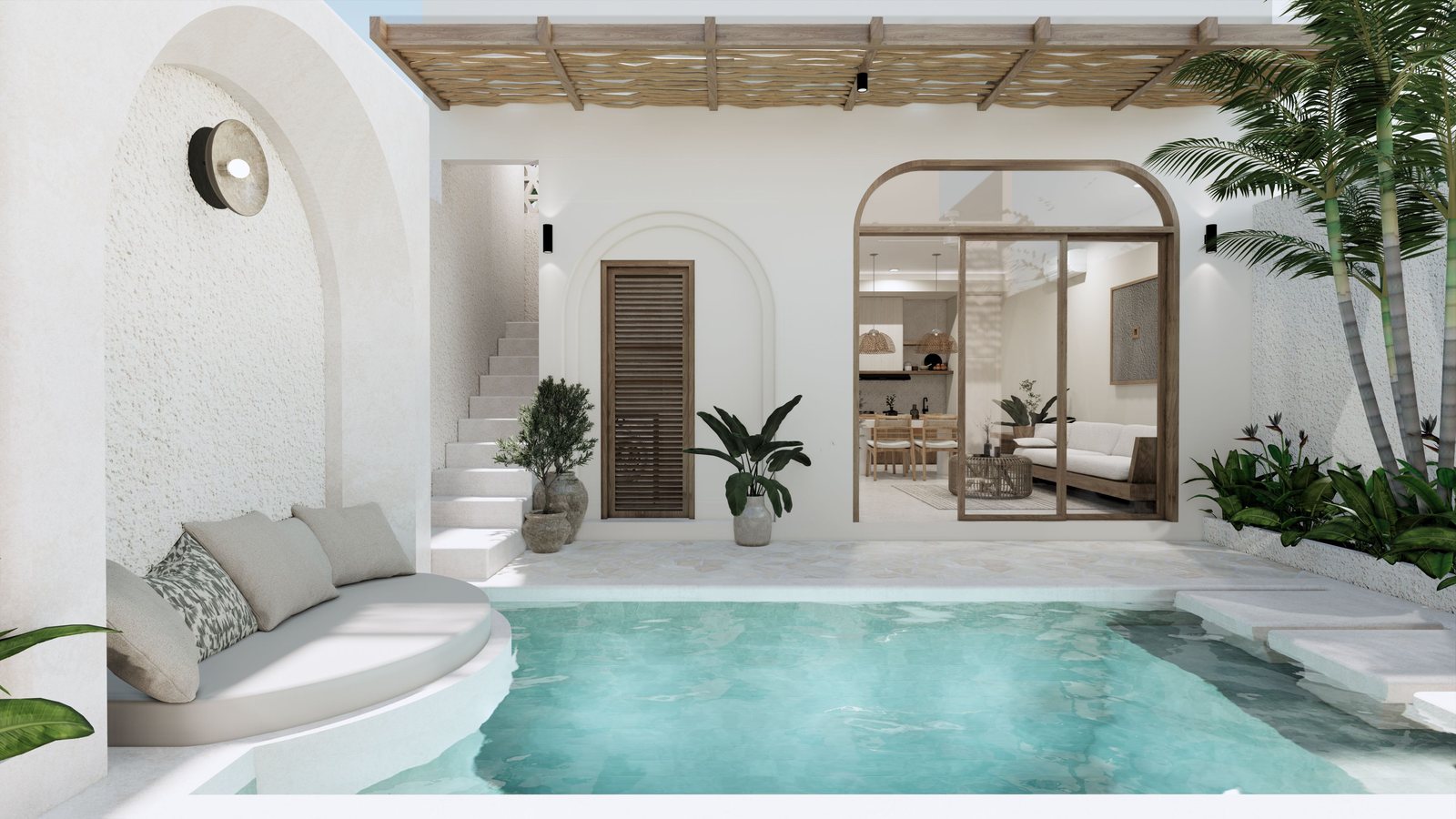 A white walled suite opening onto a private plunge pool