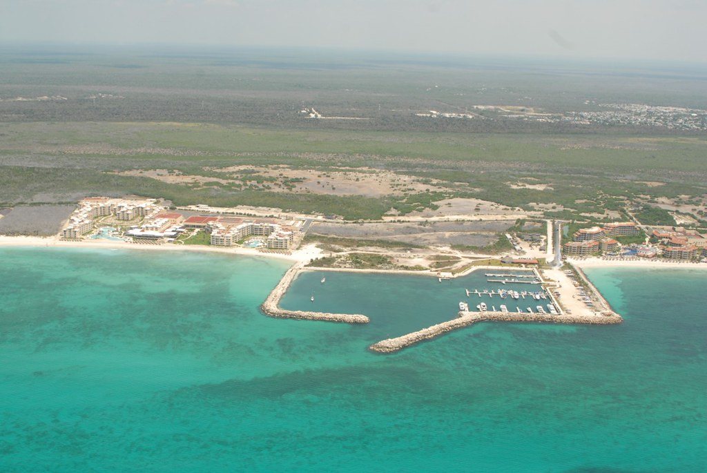Aerial view of the Puerto Morelos coast, with the marina and the reef line offshore