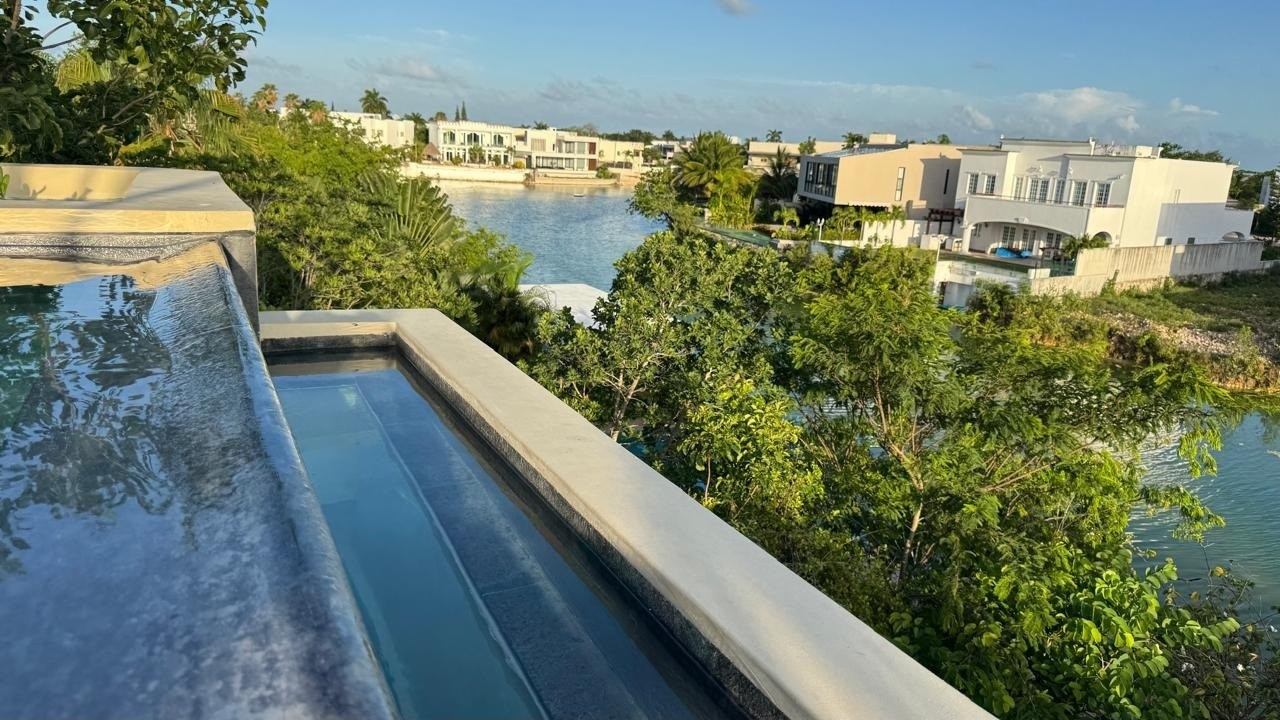 Casa Flamingos | 4 Bedroom Lakefront House with Two Pools and Solar in Lagos del Sol, Cancún